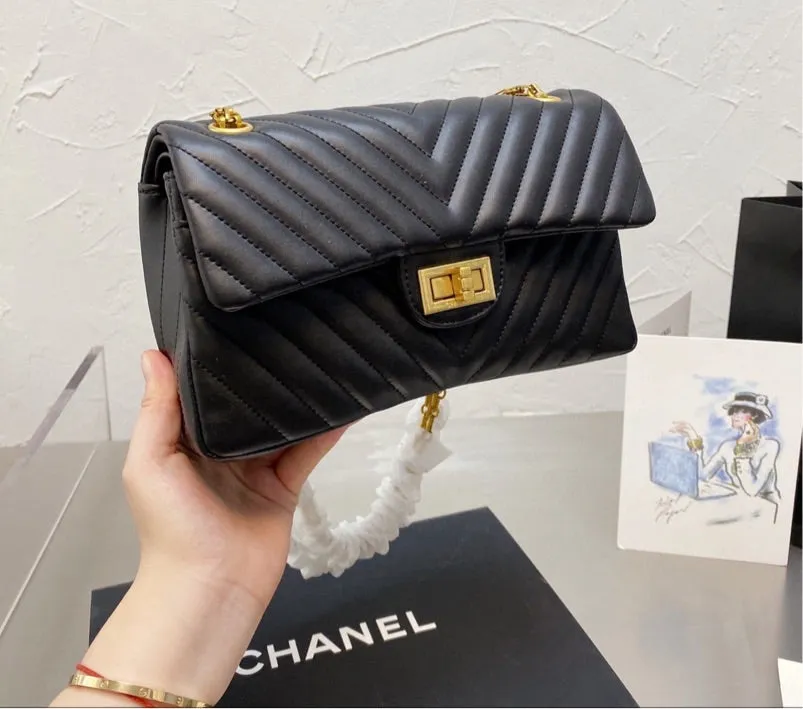 Black Chanel woman handbag