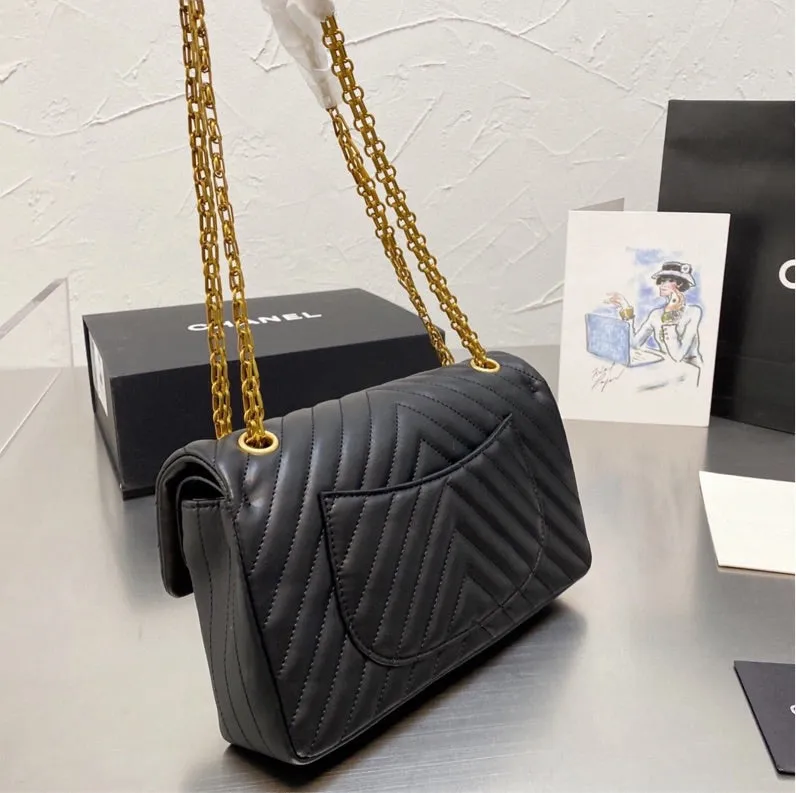 Black Chanel woman handbag